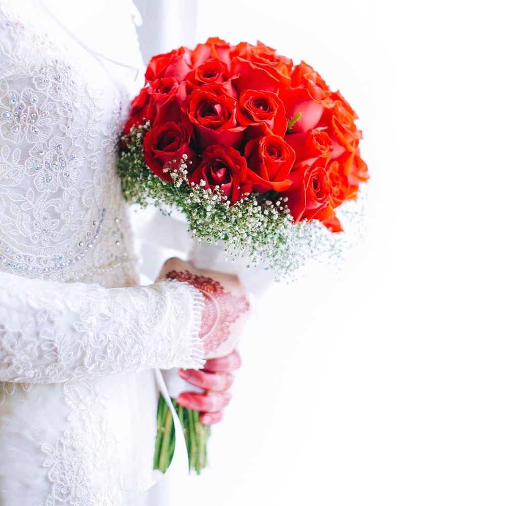 people-holding-hand-bouquet-2024-12-06-00-02-29-utc